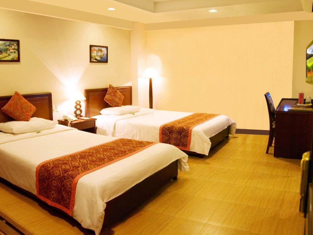 Phòng ngủ tiêu chuẩn của khách sạn Phú Quý 2 ở Nha Trang